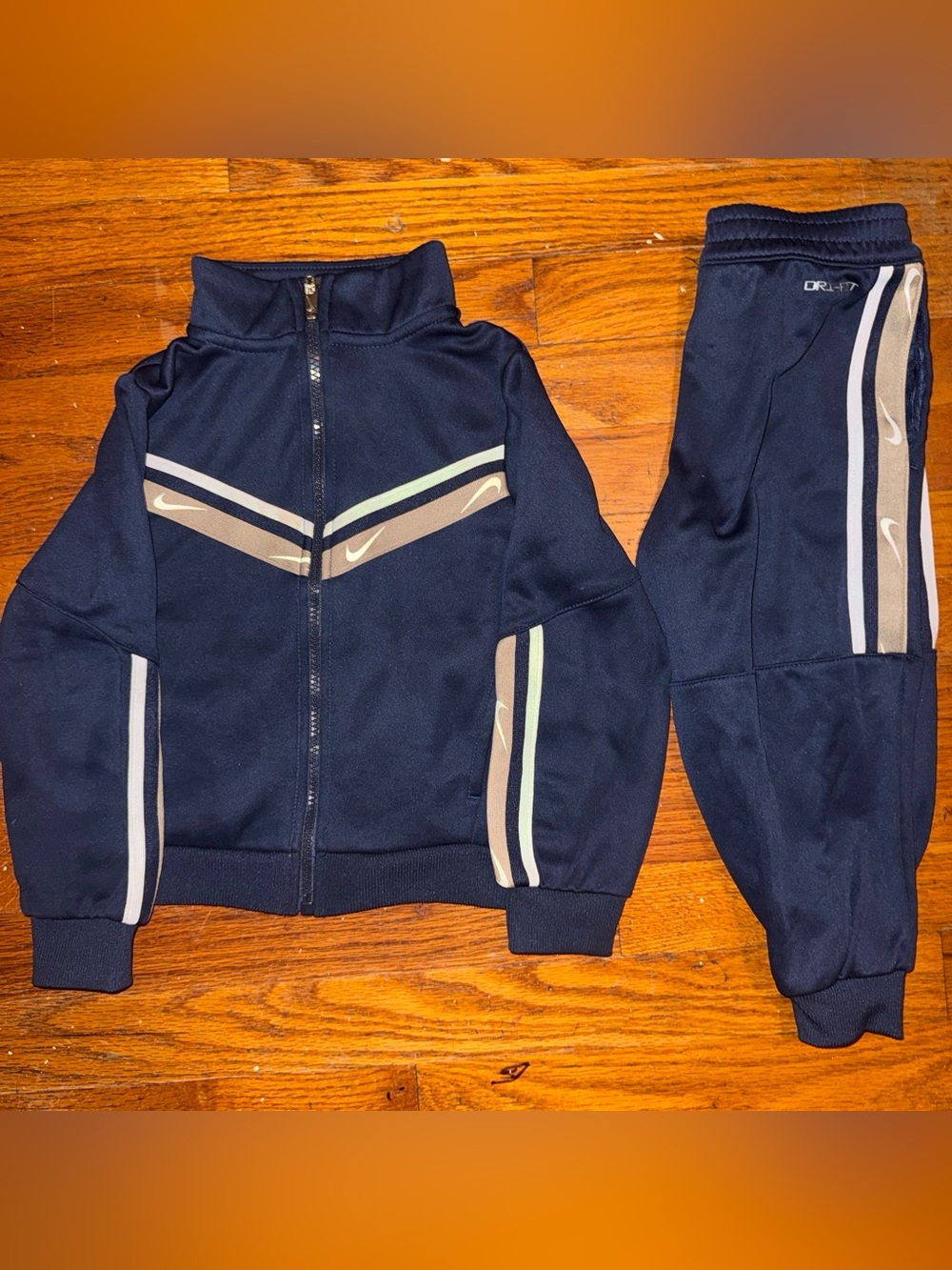 Nike Kids Navy Sweatpants & Joggers with Tan and Cream Stripes
